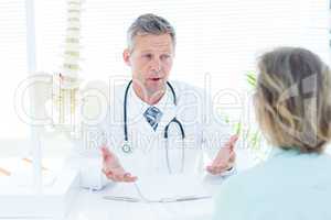 Doctor talking to his patient