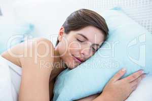 Beautiful woman sleeping in her bed