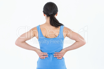 Pretty brunette suffering from back pain