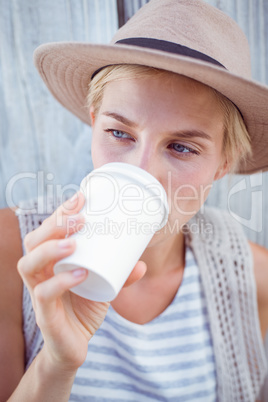 Pretty blonde woman drinking coffee