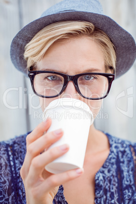 Pretty blonde woman drinking coffee