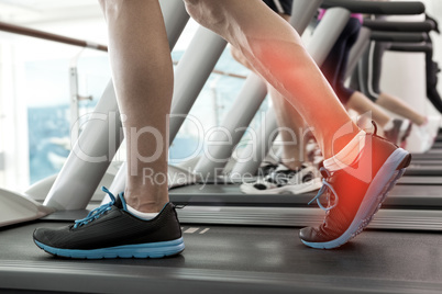 Highlighted ankle of man on treadmill