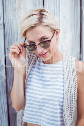 Pretty blonde woman smiling at the camera