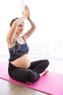 Pregnant woman keeping in shape