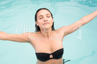 Beautiful woman in bikini relaxing