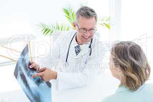 Doctor showing xray to his patient