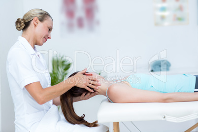 Physiotherapist doing neck massage