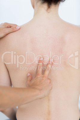 Physiotherapist doing back massage