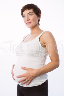 Pregnant woman holding her bump