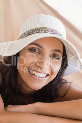 Pretty brunette relaxing on a hammock