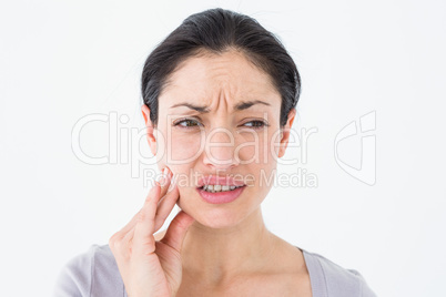 Woman suffering from teeth pain