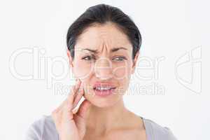 Woman suffering from teeth pain