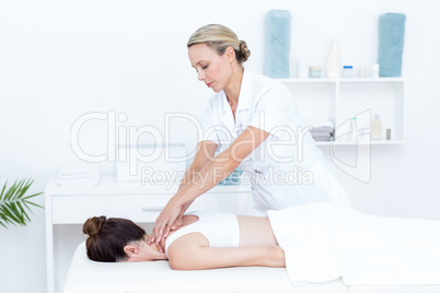 Physiotherapist doing shoulder massage