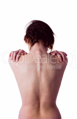 Nude woman with a shoulder injury