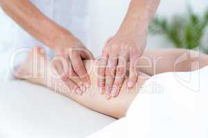 Physiotherapist doing leg massage