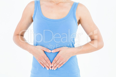 Woman touching her painful stomach