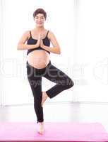 Pregnant woman keeping in shape