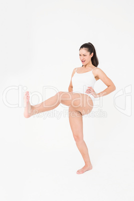 Fit woman practicing karate