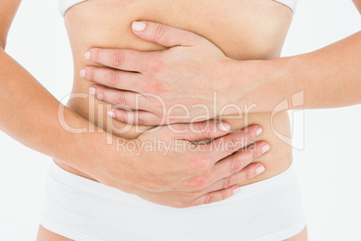 Fit woman with stomach pain