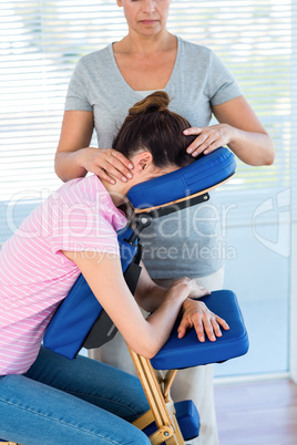 Woman having neck massage