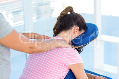 Woman having shoulders massage