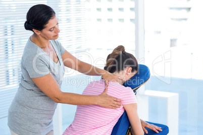 Woman having shoulders massage