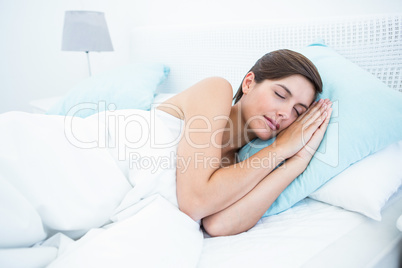 Beautiful woman sleeping in her bed