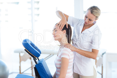 Woman having neck massage