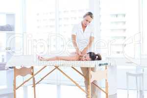 Woman having back massage
