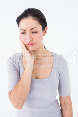 Woman suffering from teeth pain