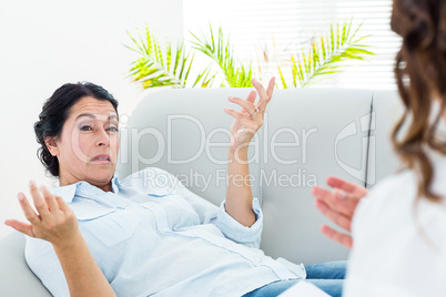 Depressed woman talking to her therapist