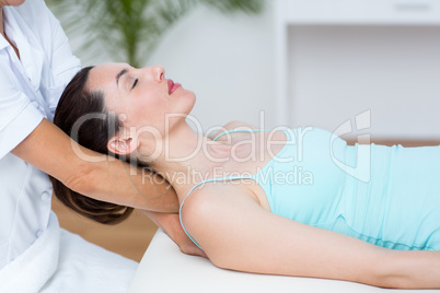 Physiotherapist doing neck massage