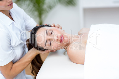 Physiotherapist doing neck massage