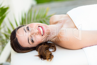 Calm woman lying on massage table