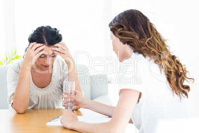 Depressed woman talking to her therapist