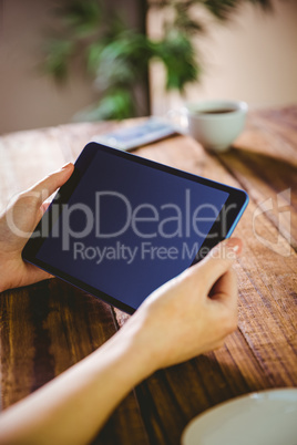 Woman using her tablet pc Woman using her tablet pc