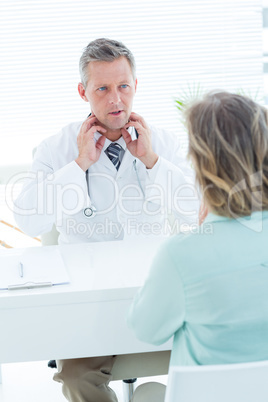 Doctor having conversation with his patient