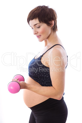 Pregnant woman keeping in shape Pregnant woman keeping in shape