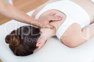Physiotherapist doing shoulder massage