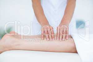 Physiotherapist doing leg massage