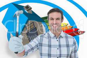 Composite image of happy handyman holding hammer