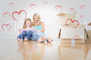 Composite image of mother and daughter reading a book