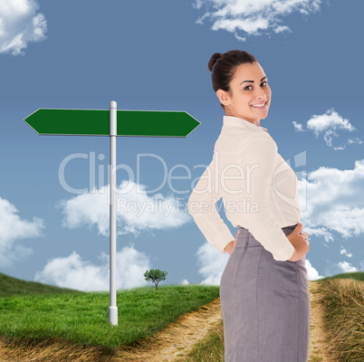 Composite image of worried businesswoman