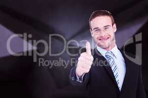 Composite image of positive businessman smiling with thumb up