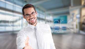 Composite image of happy businessman with glasses offering hands