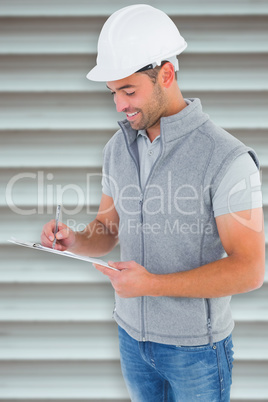 Composite image of smiling manual worker writing on clipboard