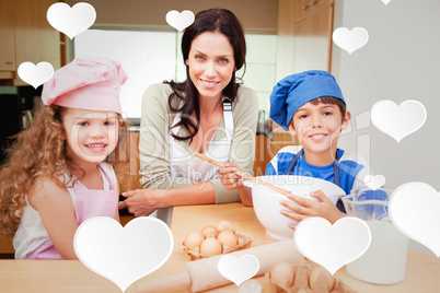 Composite image of mother and her children preparing cake