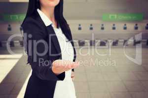 Composite image of pretty businesswoman presenting with hand