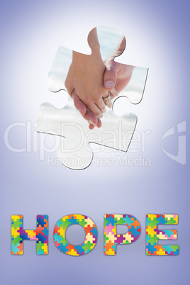 Composite image of newlyweds holding hands