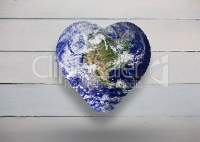 Composite image of heart shaped earth